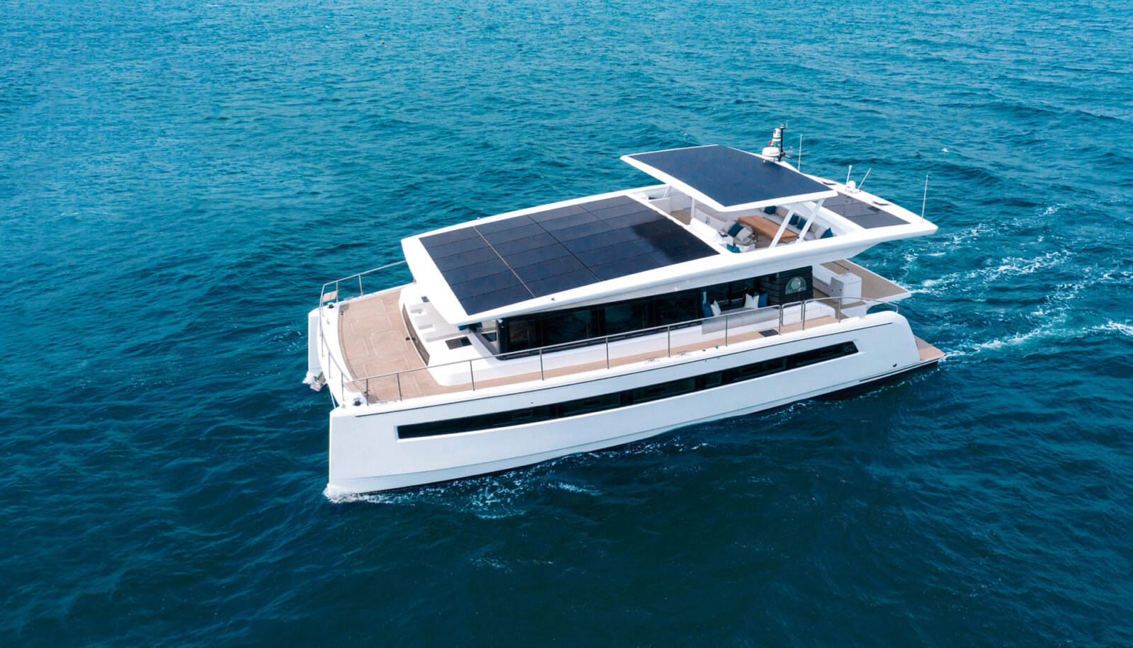 Aerial view of full electric yacht with solar panels and bidirectional dc dc converters from epic power